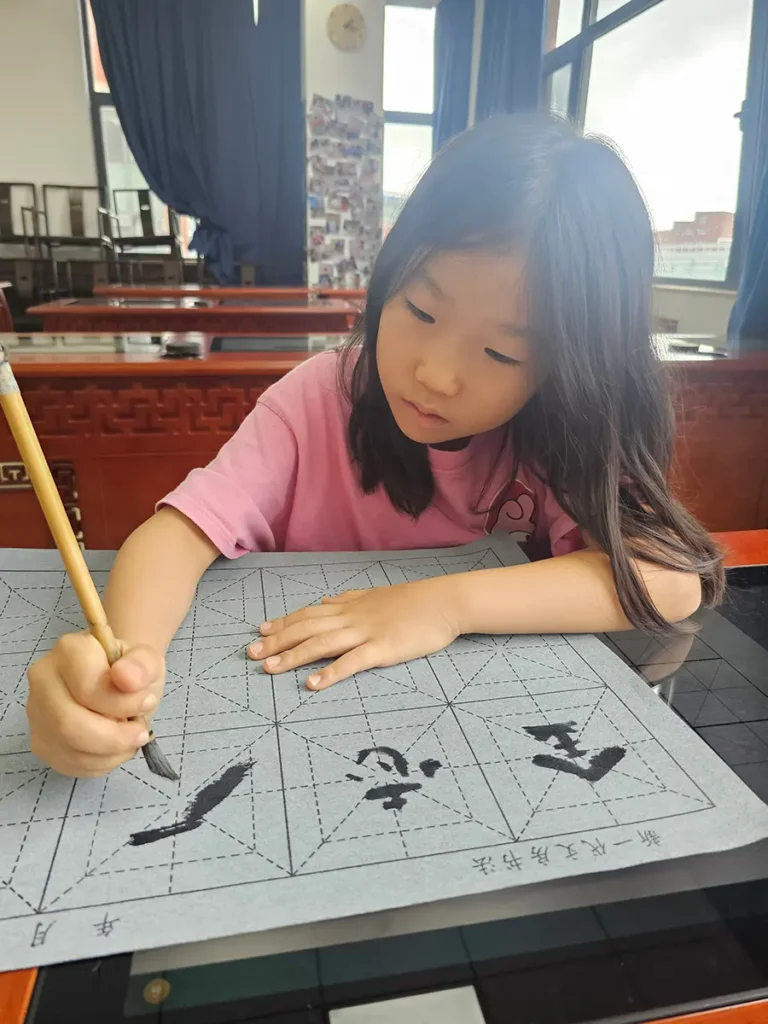 QISS_Art_Class_Calligraphy_Tablet_01-768x1024 Students Explore the Art of Chinese Calligraphy
