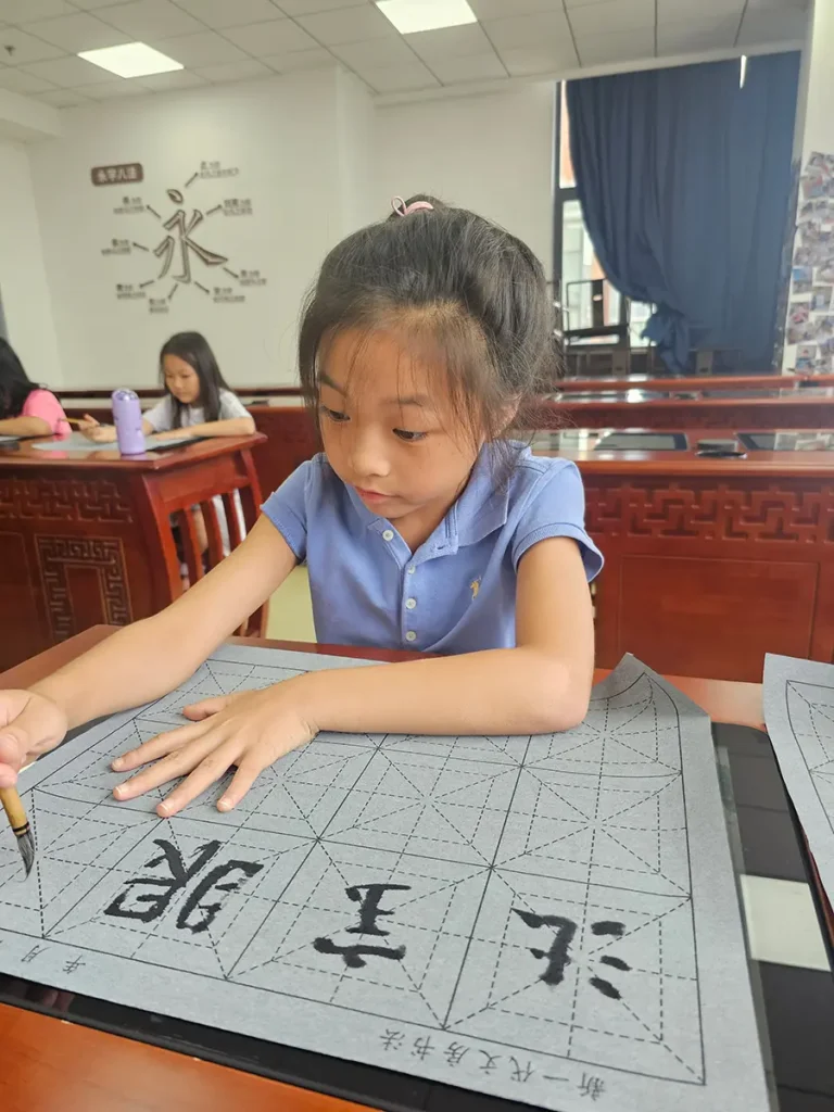 QISS_Art_Class_Calligraphy_Tablet_02-768x1024 Students Explore the Art of Chinese Calligraphy