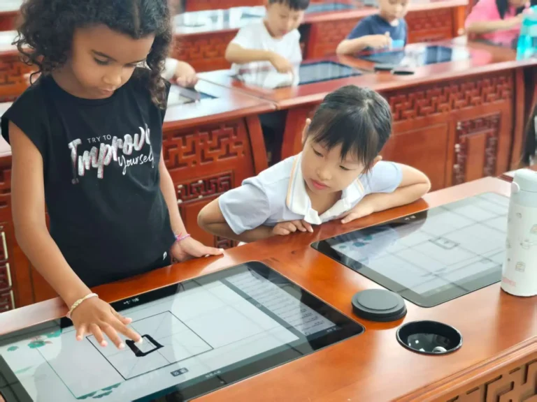 QISS_Chinese_Calligraphy_Student_Tablet_01-768x576 Students Explore the Art of Chinese Calligraphy