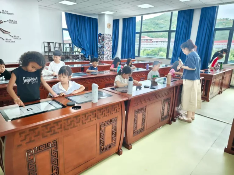 QISS_Chinese_Calligraphy_Student_Tablet_02-768x576 Students Explore the Art of Chinese Calligraphy