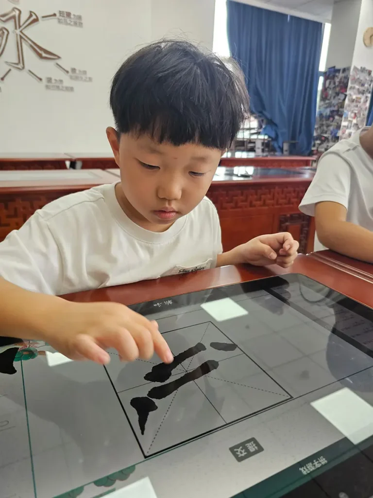 QISS_Digital_Calligraphy_Class_Student_01-768x1024 Students Explore the Art of Chinese Calligraphy